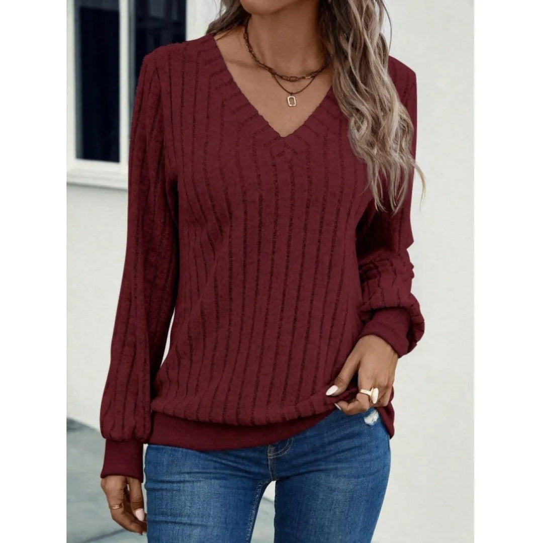 Top femme mode, col V et manches longues rayées, effet brossé élégant et décontracté.