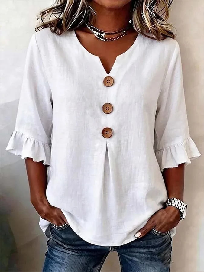 Chemisier femme fluide col V boutonné, manches mi-longues, idéal pour un look décontracté et élégant en été.