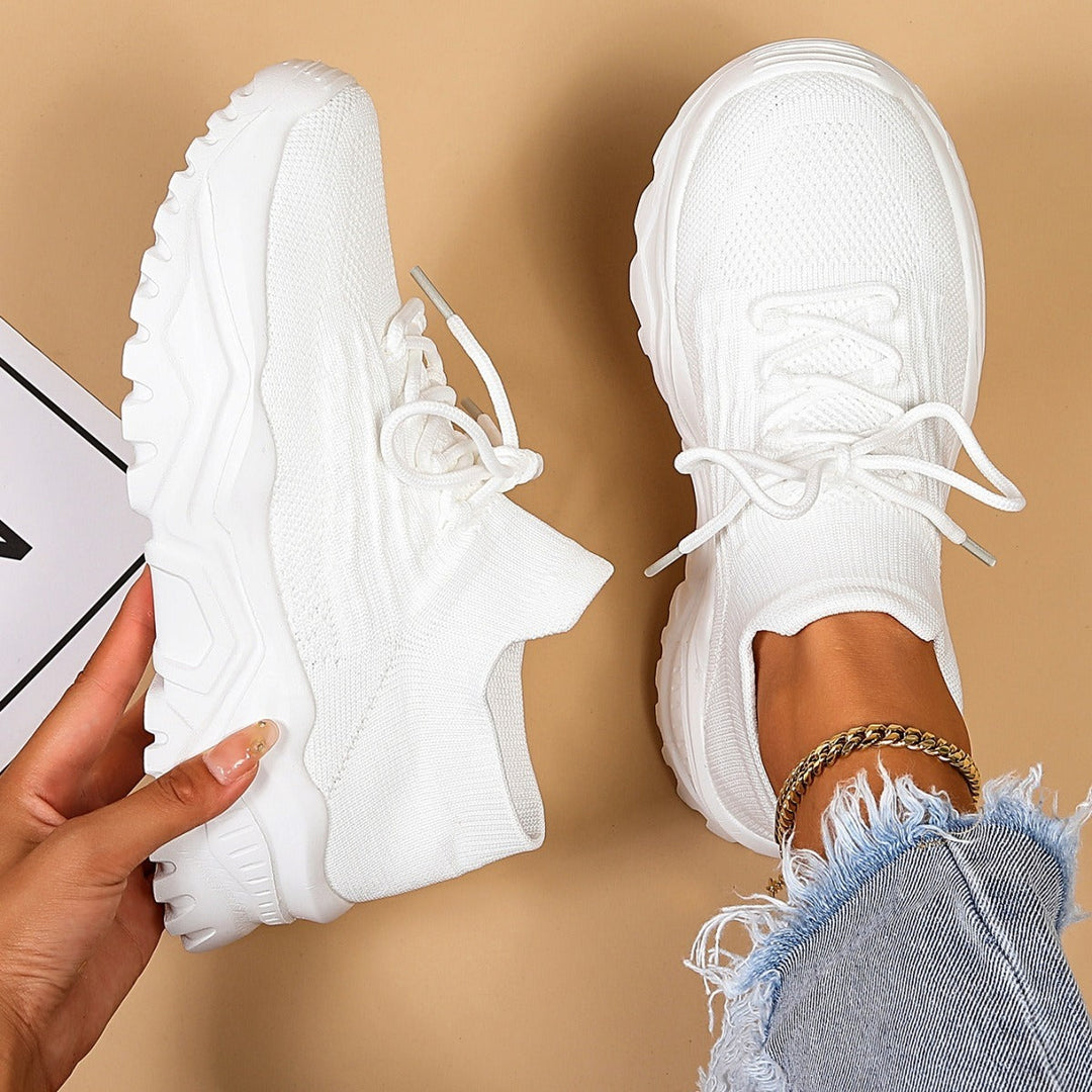 Sneakers plateforme femme, respirantes et confortables, pour un style urbain moderne et actif.