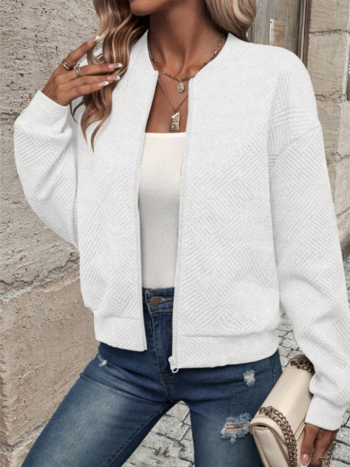 Gilet long femme élégant, avec manches longues et fermeture éclair. Idéal pour l'automne.