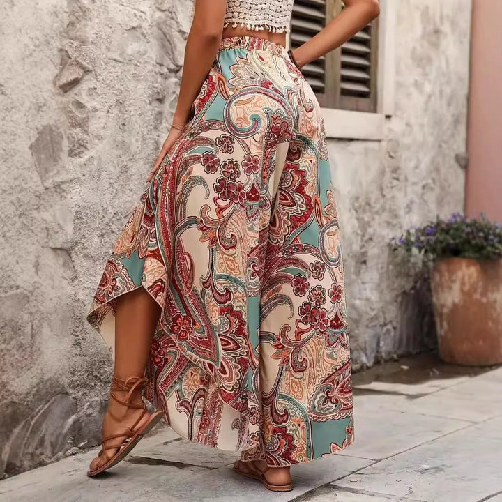 Pantalon large imprimé bohème pour femme. Tissu fluide, parfait pour un look estival chic, confortable et polyvalent.