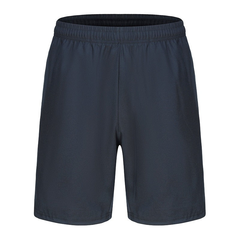 Athlète portant un short de sport homme haute performance, offrant liberté de mouvement et un confort exceptionnel pour le sport.