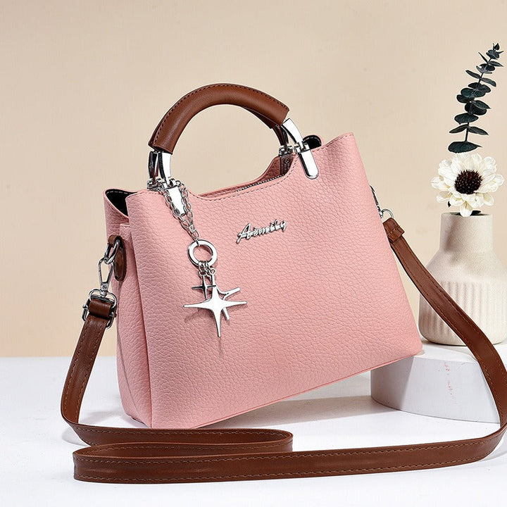 Sac à main femme élégant en simili-cuir, design chic pour le quotidien et les sorties mode.