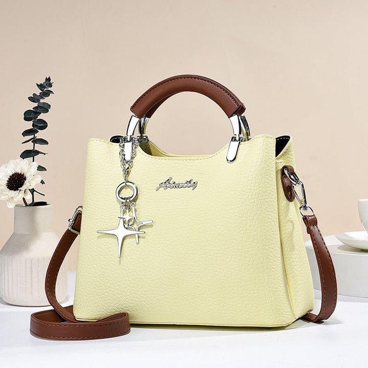Sac à main chic en simili-cuir pour femme, accessoire mode indispensable, parfait pour l'été.
