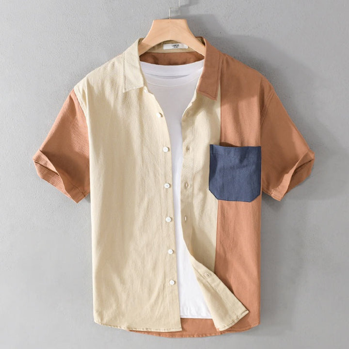 Chemise patchwork homme manches courtes, style original et décontracté pour l'été.