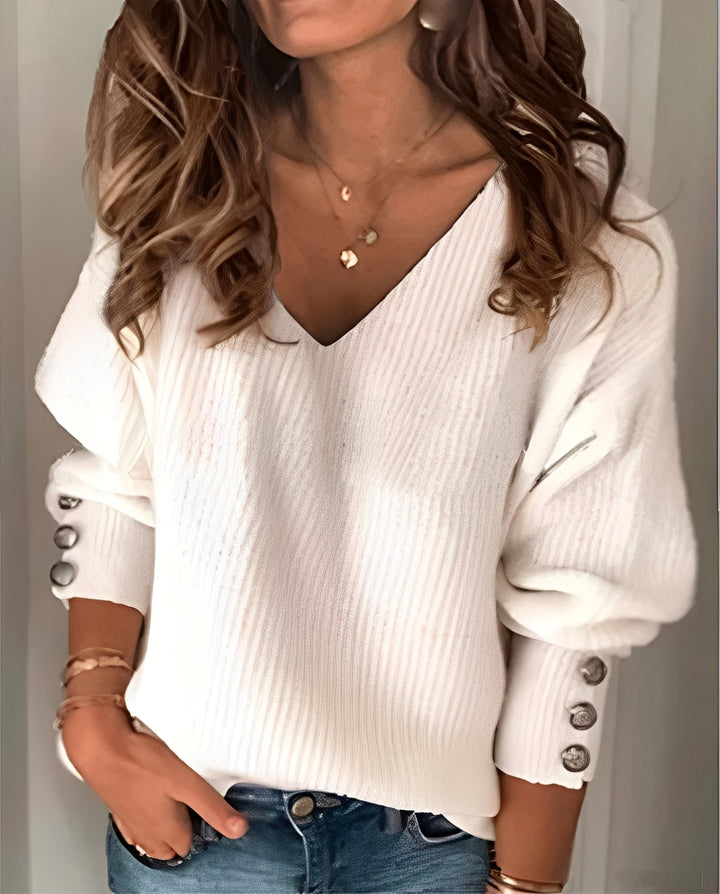 Pull en maille pour femme, col V. Confortable et élégant, ce chandail est parfait pour la mode féminine.