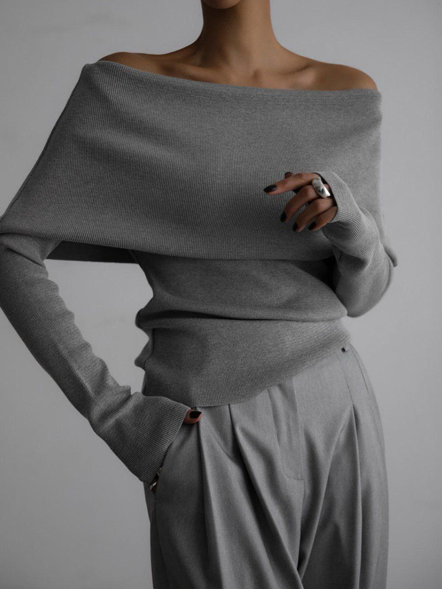 Pull femme encolure bateau, épaules dénudées. Confortable et chic, idéal pour l'automne.