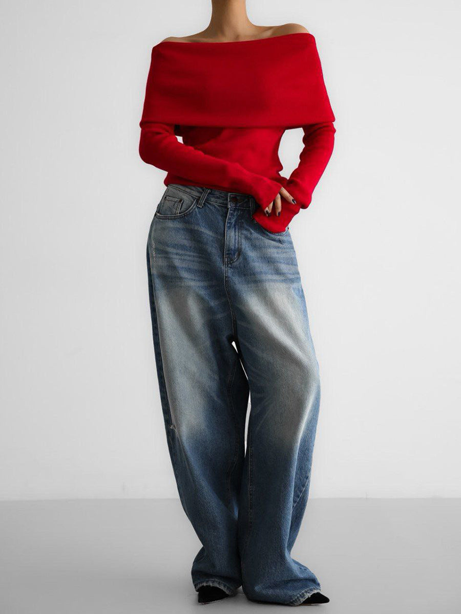 Pull chic femme à manches longues, épaules dénudées, encolure bateau. Parfait pour une tenue de soirée.