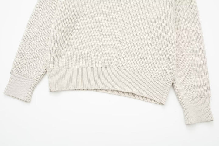Pull à rayures femme, col montant et demi-zip. Vêtement confortable et élégant, parfait pour l'automne.