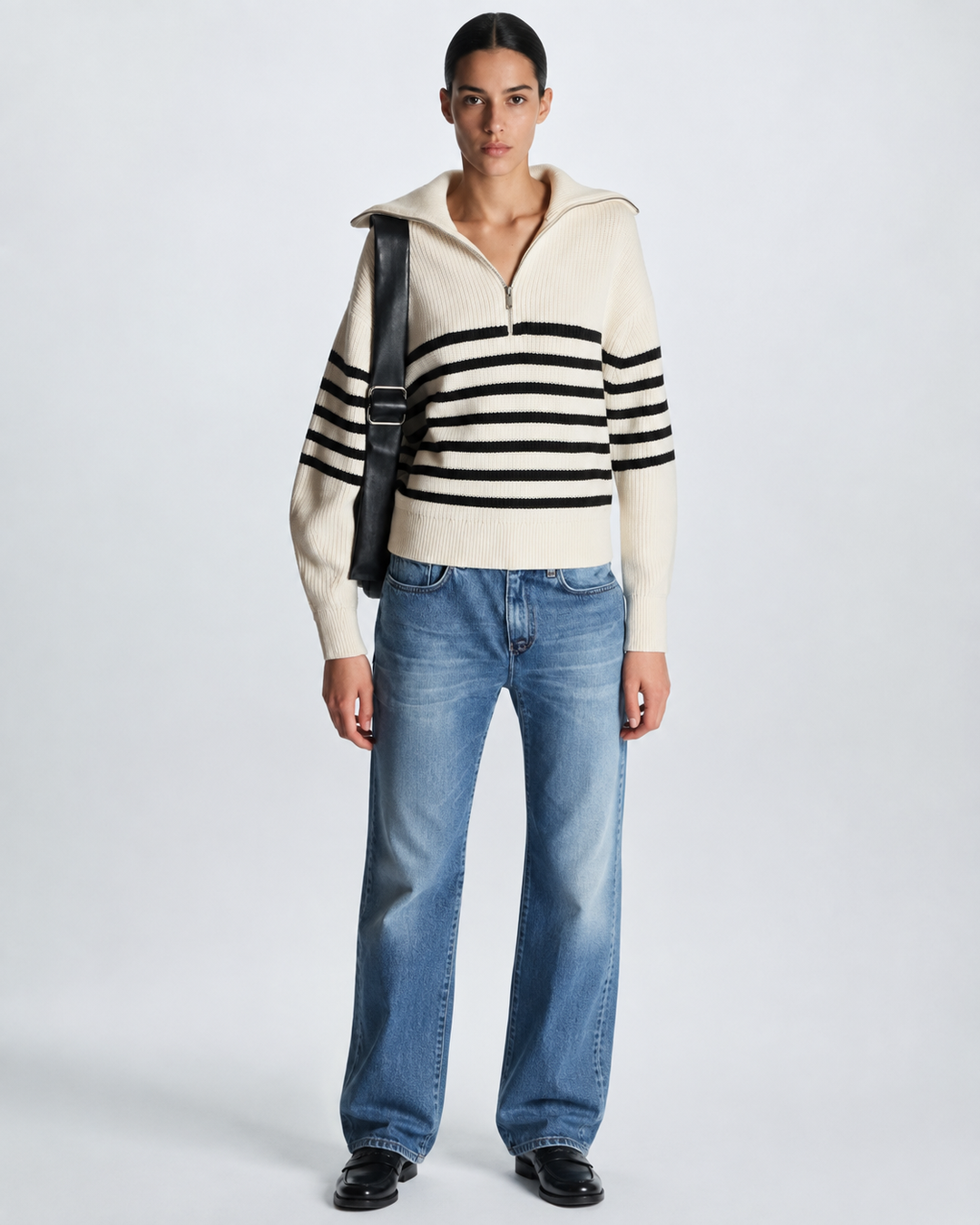 Pull femme élégant à col montant et demi-zip. Confortable, parfait pour la mode automne décontractée.