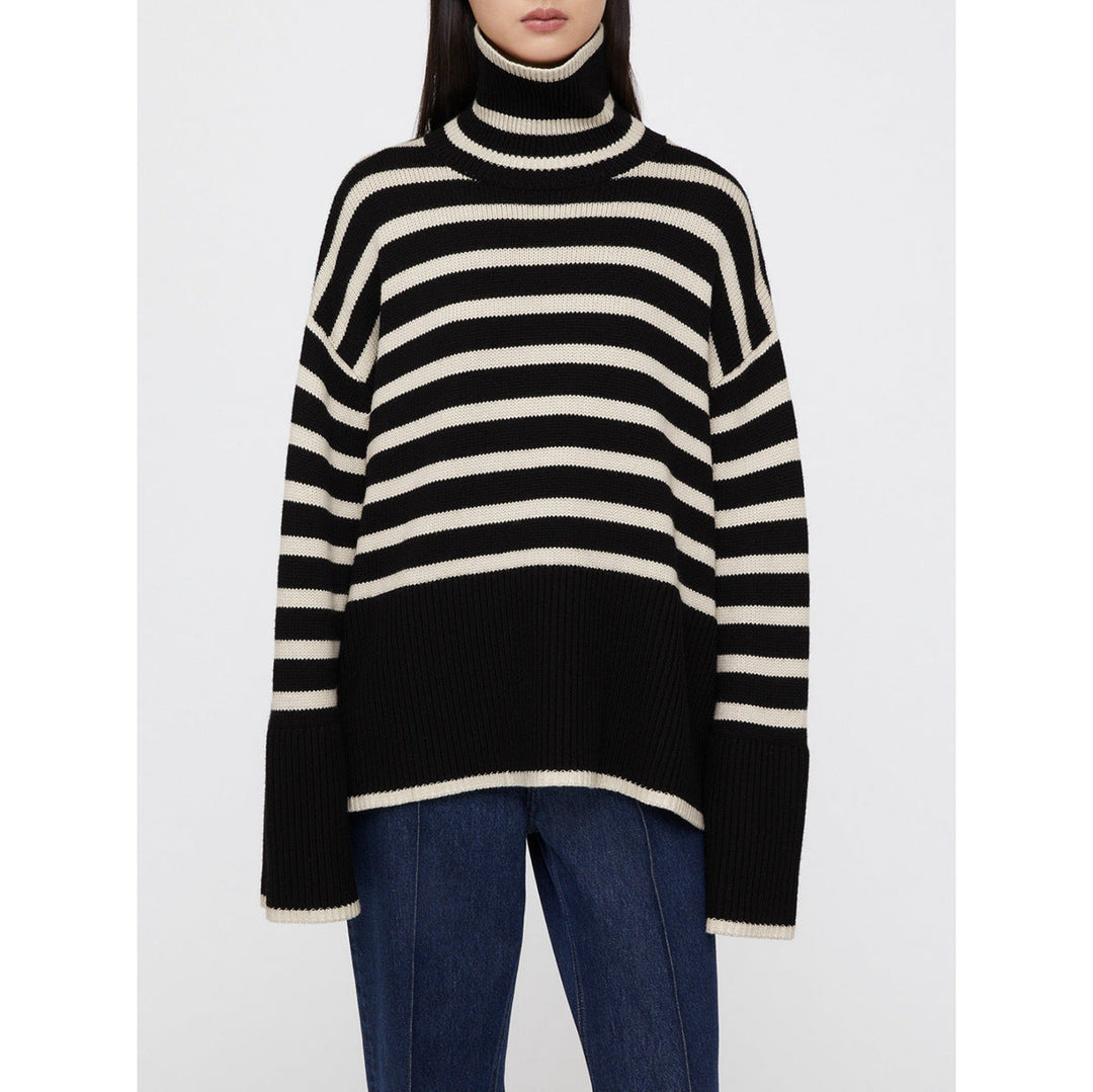 Pull femme oversize confortable à rayures, col roulé douillet, manches amples. Parfait pour l'automne-hiver.