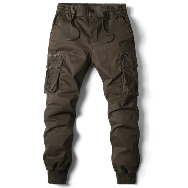 Pantalon jogger cargo homme avec poches zippées, idéal pour mode urbaine et tenue décontractée.
