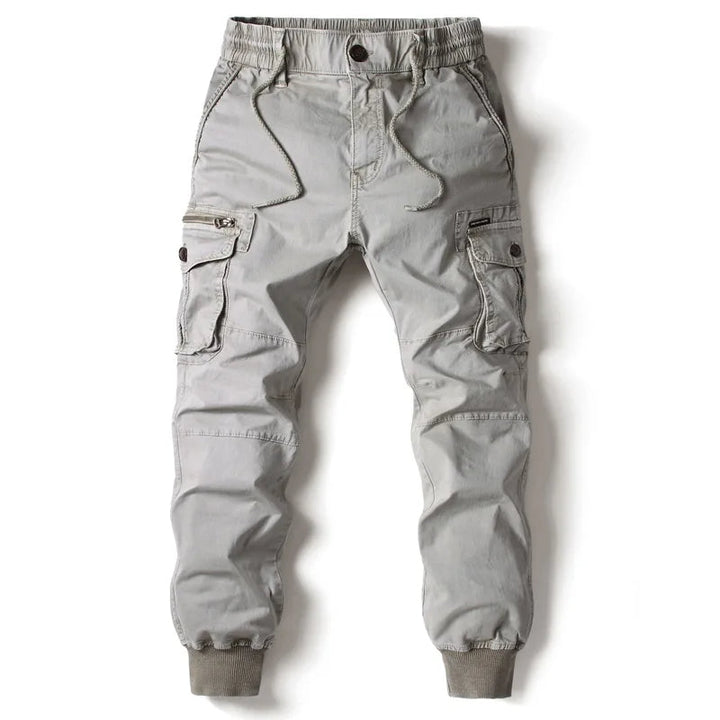 Jogger cargo homme kaki, poches multiples, ceinture élastique pour confort quotidien.
