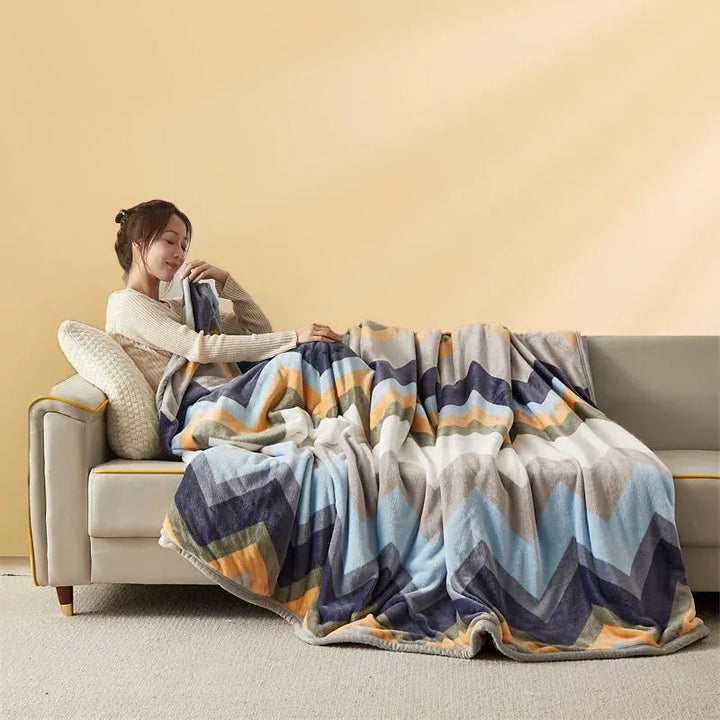 Plaid flanelle doux, idéal pour le cocooning et la chaleur douillette sur votre canapé ou lit.