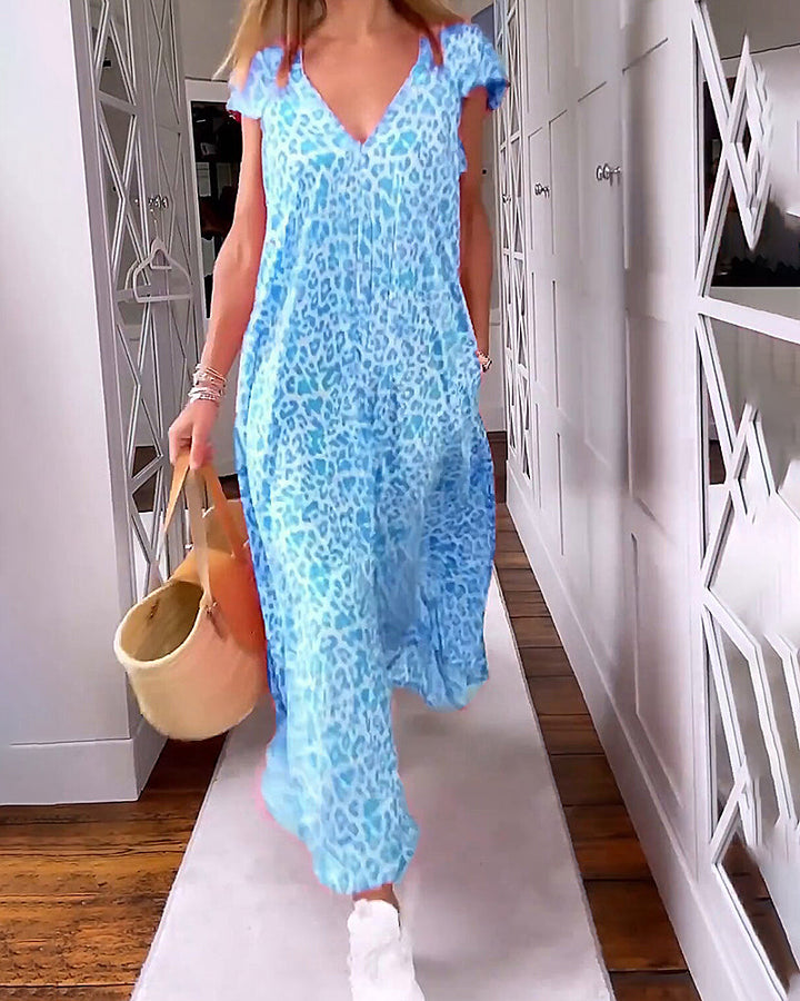 Robe maxi imprimée à col V pour femme, idéale pour l'été décontracté. Style élégant et confortable.