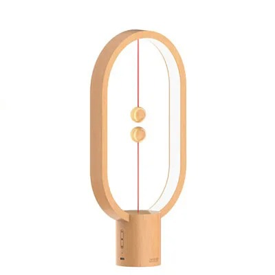 Lampe de table LED design équilibrée avec interrupteur magnétique flottant, idéale pour déco moderne et bureau.