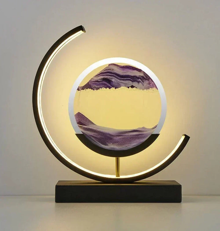 Lampe décorative avec paysage de sable mouvant relaxant, créant une ambiance zen avec sa lumière douce.