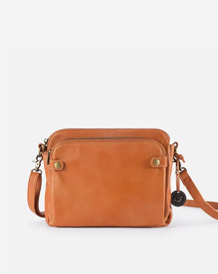 Sac bandoulière unisexe élégant et fonctionnel, idéal pour l'organisation quotidienne de vos essentiels. Accessoire mode.