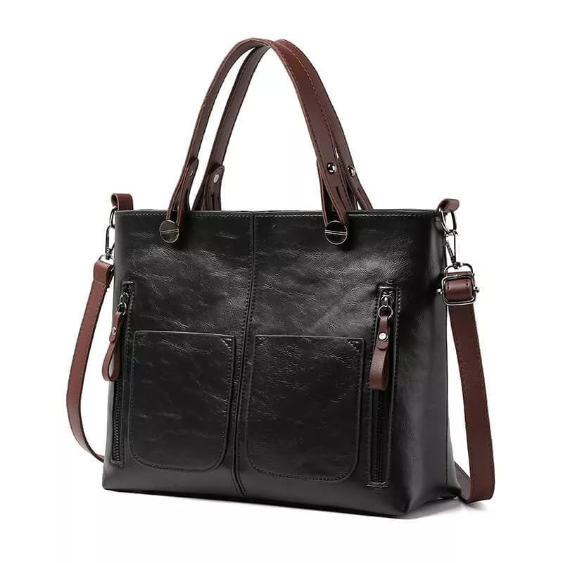 Sac bandoulière femme en cuir noir, élégant et durable. Bretelle ajustable pour un port confortable.