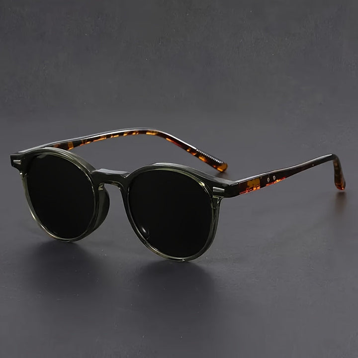 Monture ronde vintage pour hommes, lunettes de soleil écaille de tortue. Style rétro chic en polycarbonate.