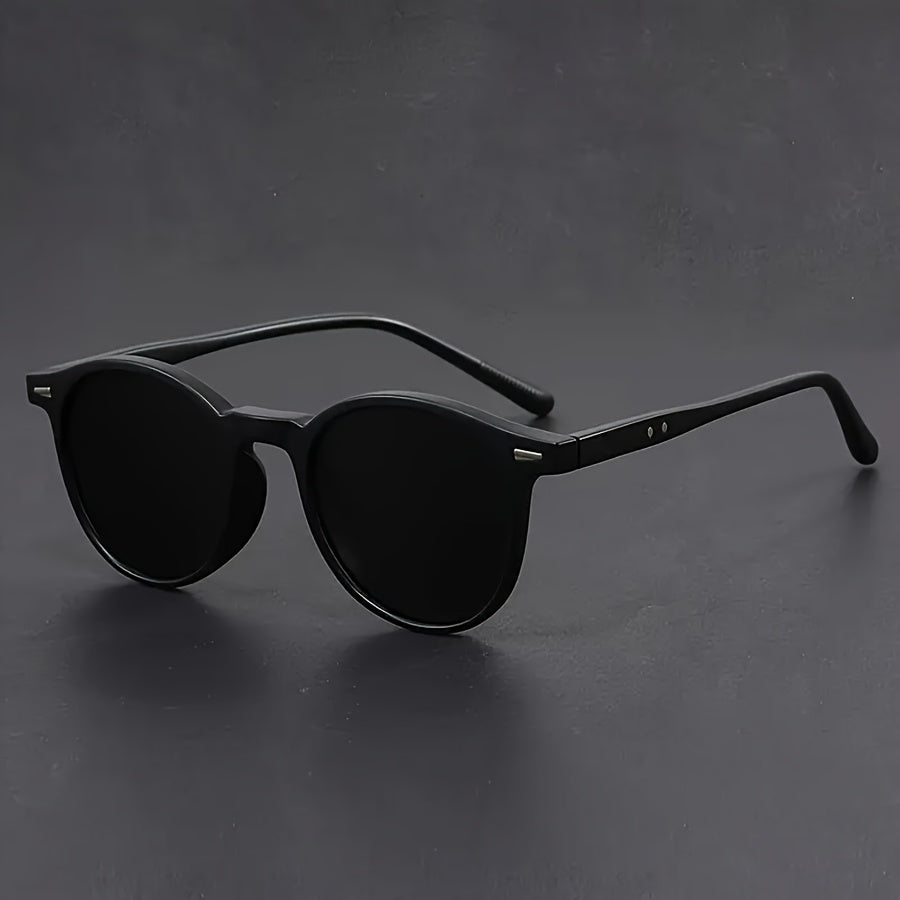 Lunettes de soleil homme rétro, monture ronde écaille de tortue. Design vintage, parfait pour la mode masculine.