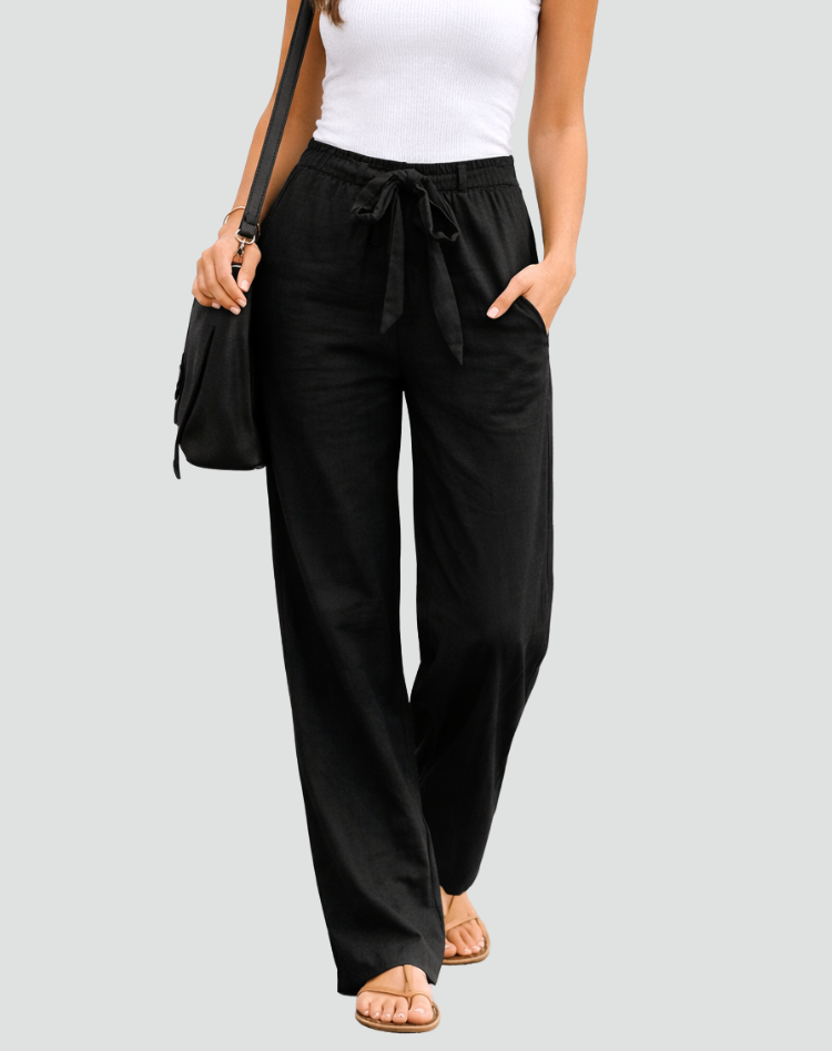 Pantalon ample femme, jambe large, parfait pour une tenue décontractée ou élégante.