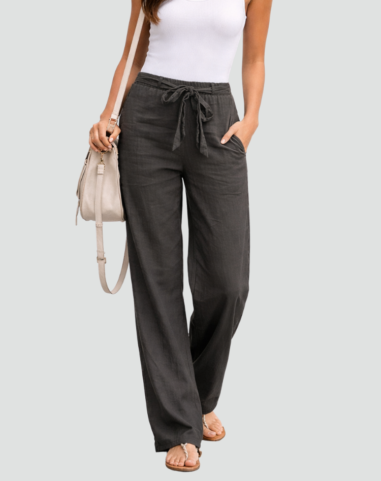 Pantalon large fluide femme en tissu léger, idéal pour une silhouette élégante et décontractée au quotidien.