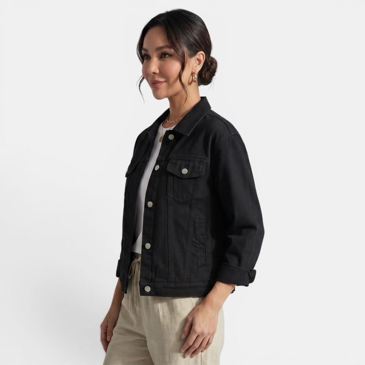 Détail dos d'une veste courte ajustée femme. Style urbain et week-end chic. Blouson polyvalent.