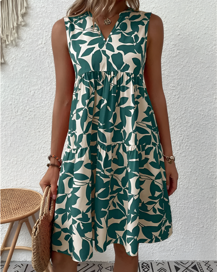 Robe midi d'été fluide Magnolia pour femme, élégante et respirante. Parfaite pour un style estival décontracté et confortable.