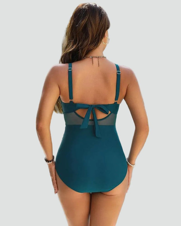 Maillot de bain élégant femme, une pièce, parfait pour la piscine et les journées chaudes d'été.