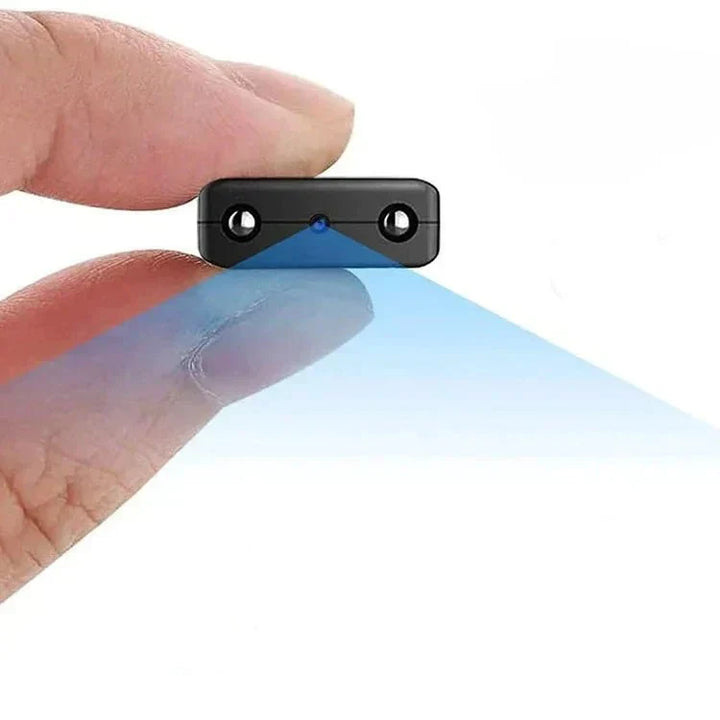 Petite caméra espion HD WiFi, discrète pour surveillance intérieure, audio et vision nocturne.
