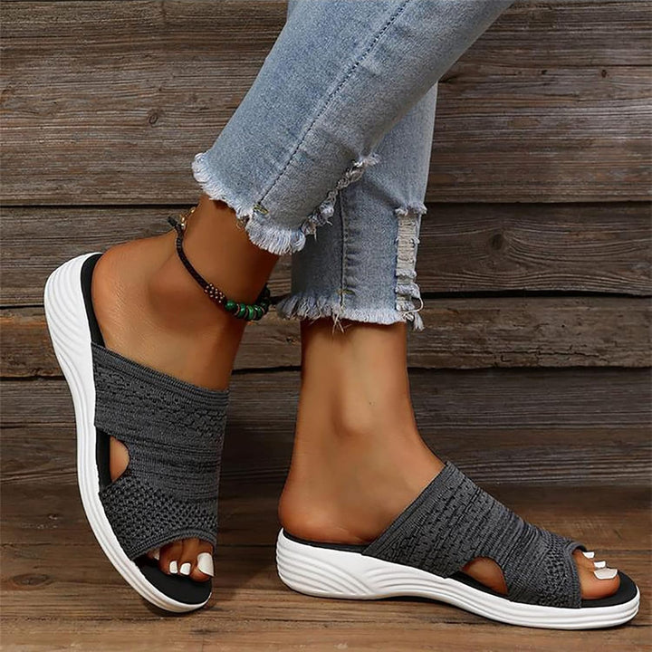 Mules respirantes et légères pour femme, amorties pour un confort durable.