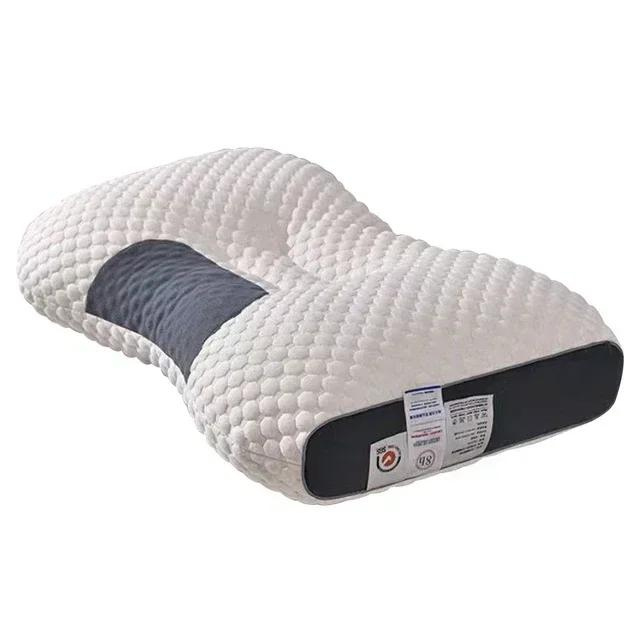 Coussin orthopédique ergonomique avec massage pour un sommeil réparateur et un soutien cervical optimal.