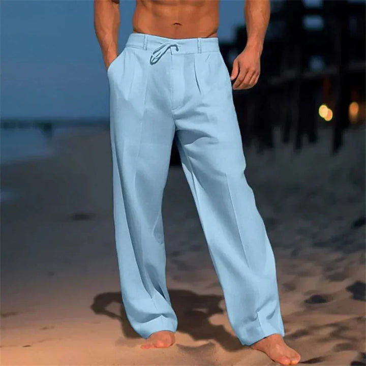 Pantalon homme polyvalent à jambes larges et pinces, pour un style chic et confortable en mode masculine.