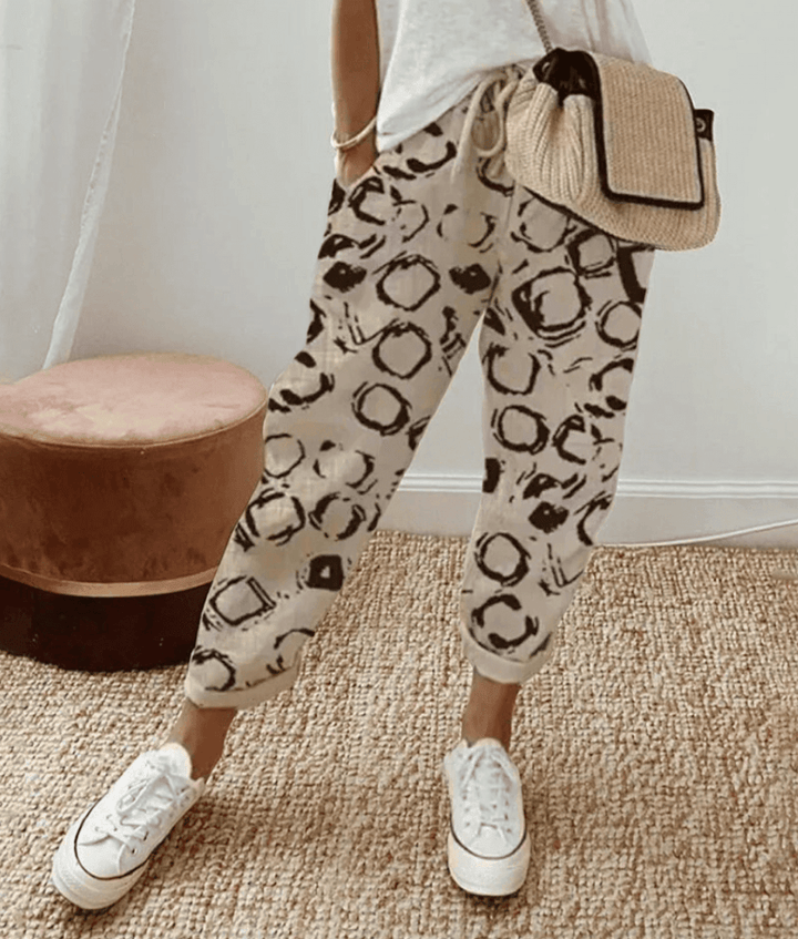 Pantalon femme fluide élégant décontracté. Confort quotidien assuré, idéal pour le printemps et l'été.