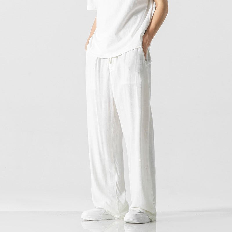 Pantalon décontracté homme ample, confortable, taille cordon, idéal été/printemps.
