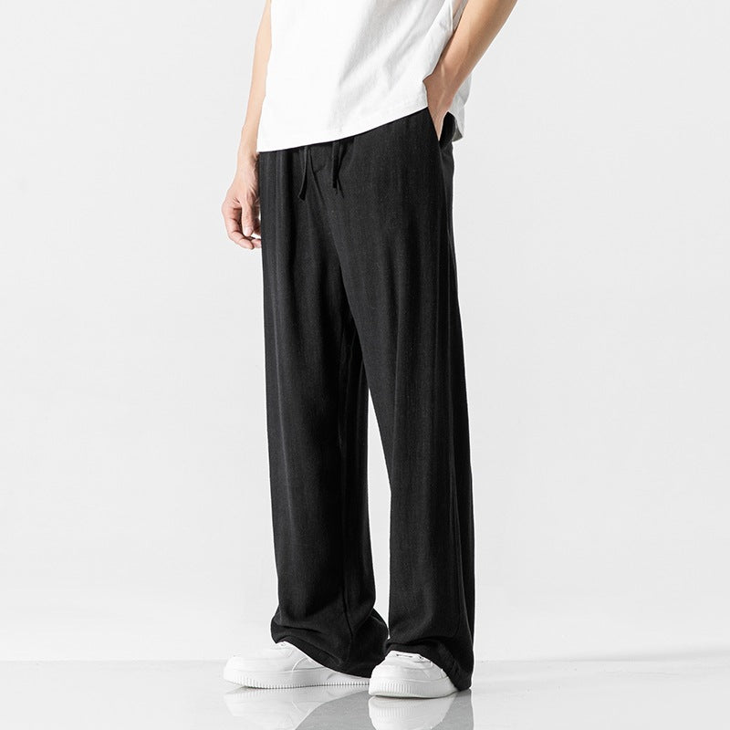 Mode homme: pantalon décontracté ample, taille ajustable par cordon, polyvalent toutes saisons.