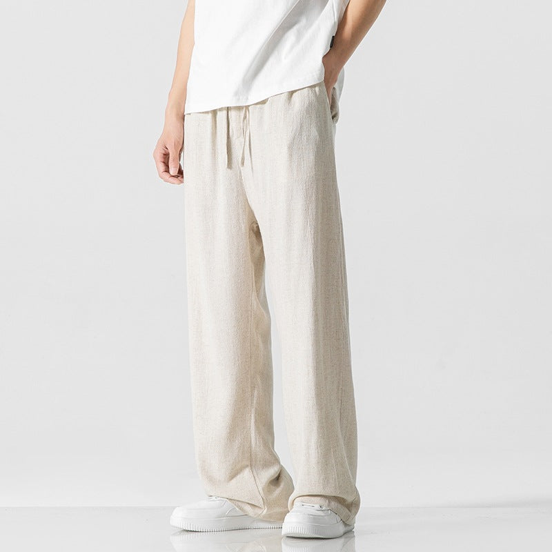 Pantalon casual homme confortable, coupe ample, parfait pour un look décontracté d'été.