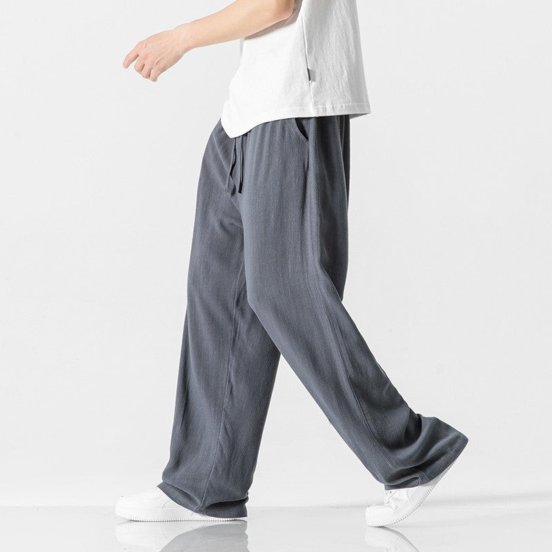 Pantalon homme décontracté et confortable, coupe ample pour l'été et le printemps.