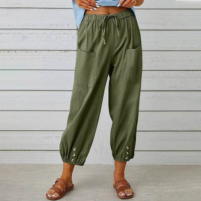 Tenue printemps femme: pantalon sarouel léger, taille élastique, ultra confortable.