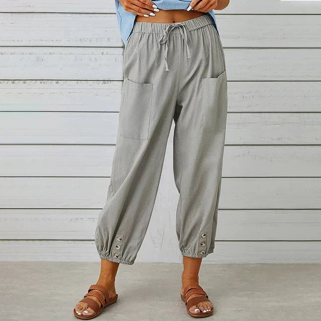 Pantalon sarouel femme fluide, idéal pour une tenue d'été décontractée et stylée.