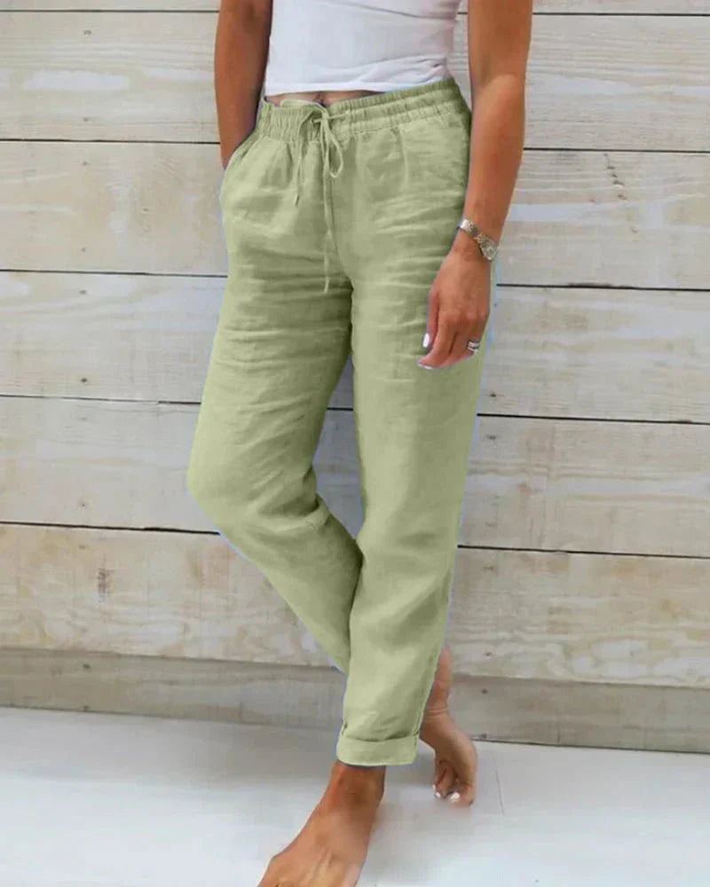 Confortable pantalon large fluide femme en coton et lin. Respirant et léger pour les journées d'été.