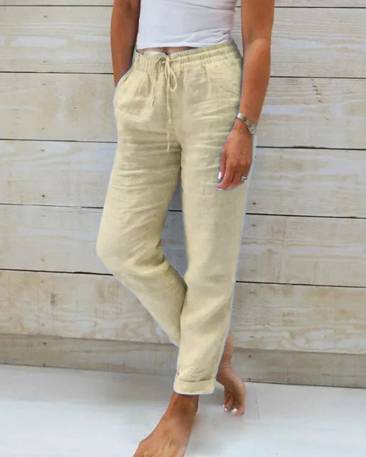 Pantalon large femme chic et fluide en coton et lin. Confort élégant pour toute occasion d'été.