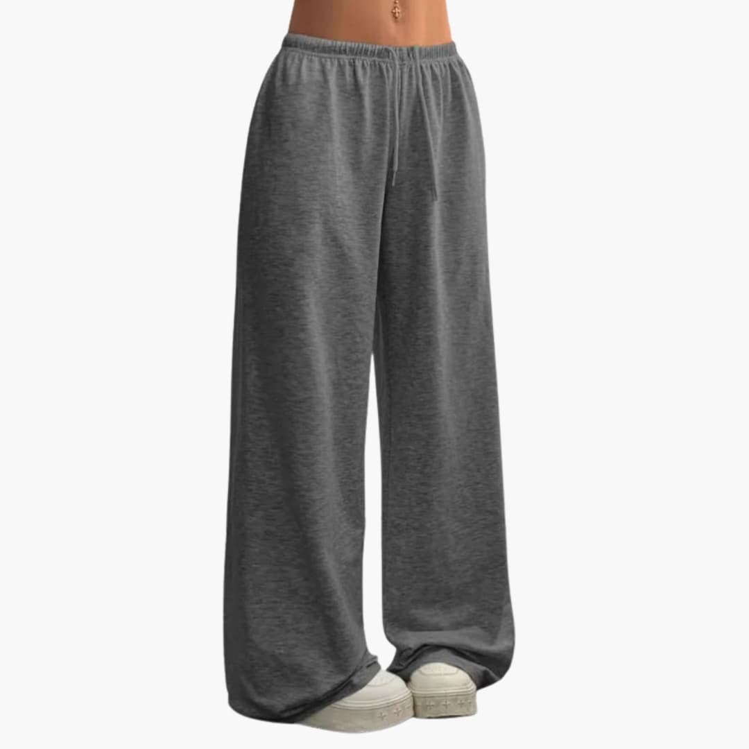 Élégant pantalon ample pour femmes, taille élastique, mode décontractée. Confortable et stylé au quotidien.
