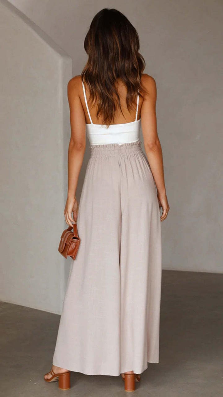 Pantalon large femme en Tencel fluide, taille haute pour une silhouette élégante.