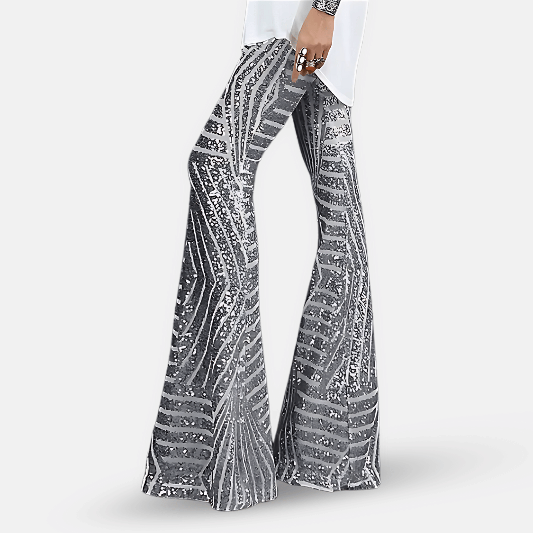 Pantalon glamour femme taille haute, pattes d'éléphant à paillettes pour une tenue festive étincelante.
