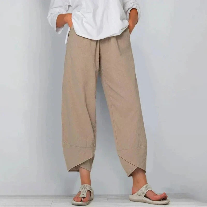 Pantalon raccourci femme jambe large décontracté, taille élastiquée, ourlet tulipe. Idéal printemps/été.