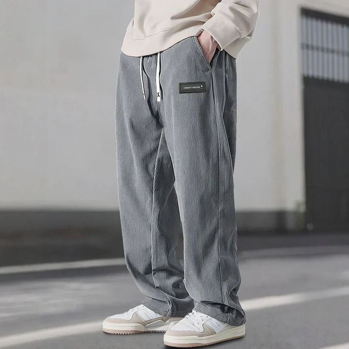 Pantalon décontracté femme velours côtelé extensible, taille cordon, style automne.