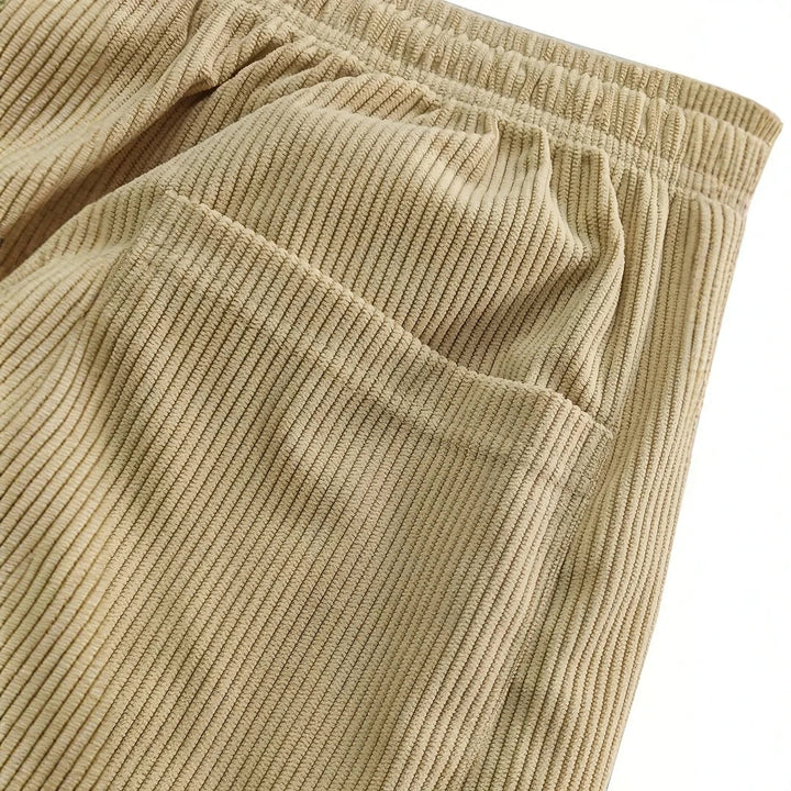 Pantalon mode femme en velours côtelé extensible, style décontracté et confortable.