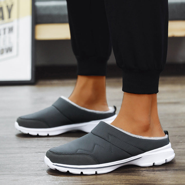 Pantoufles orthopédiques pour hommes avec soutien plantaire avancé, soulageant la fatigue et offrant un confort durable.